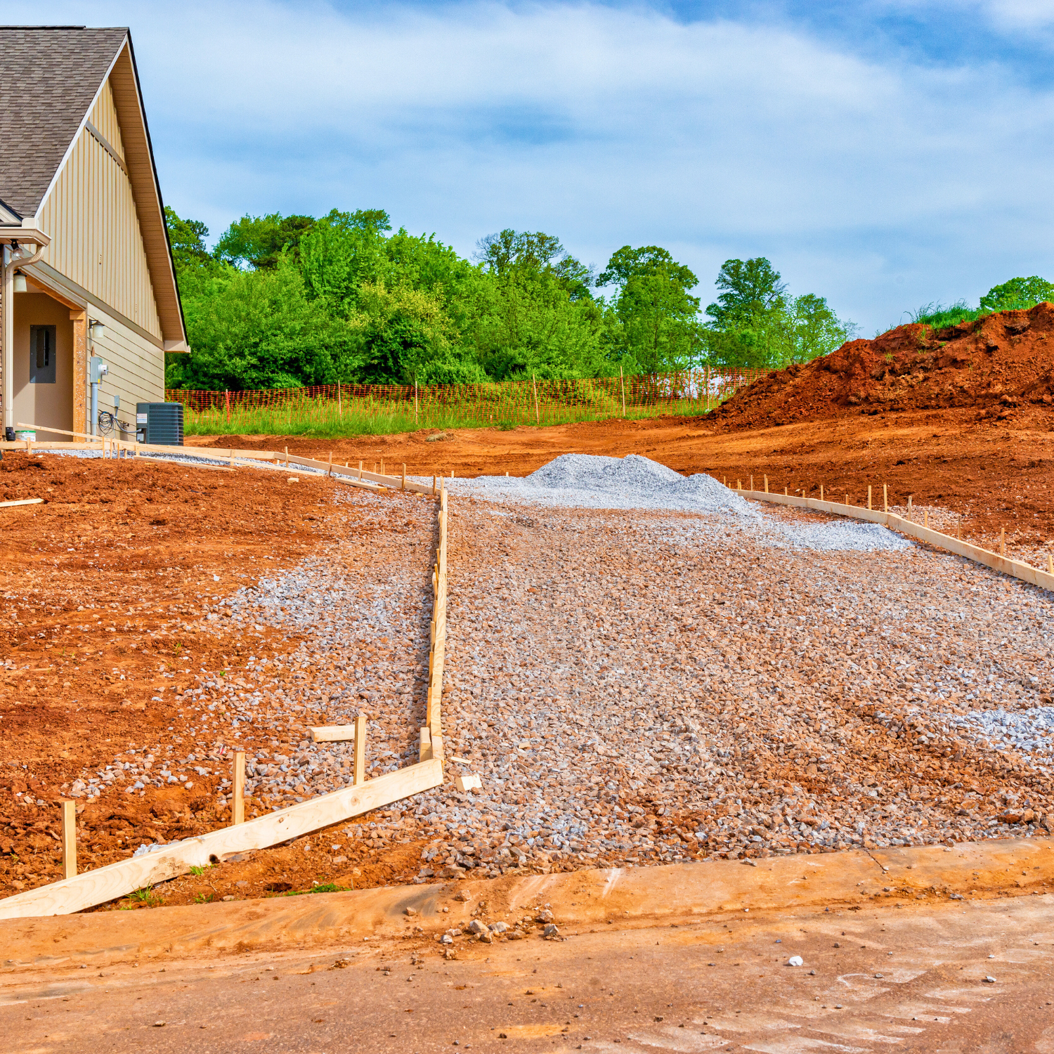 Gravel driveway installation in Northeast Texas with compacted base and clean edges